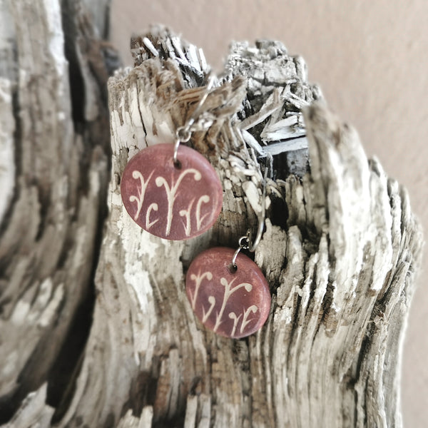 Hand-painted ceramic earrings with small pattern