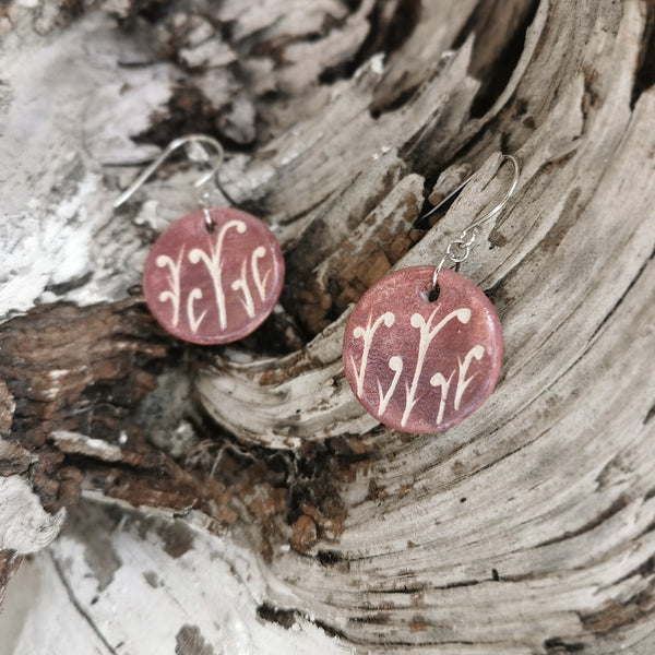 Hand-painted ceramic earrings with small pattern