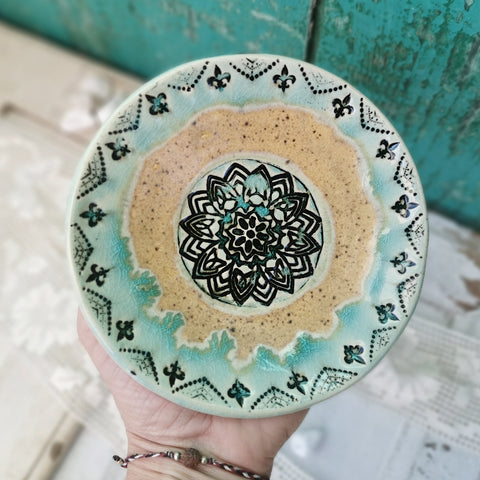 Honey brown and turquoise ceramic bowl with mandala pattern