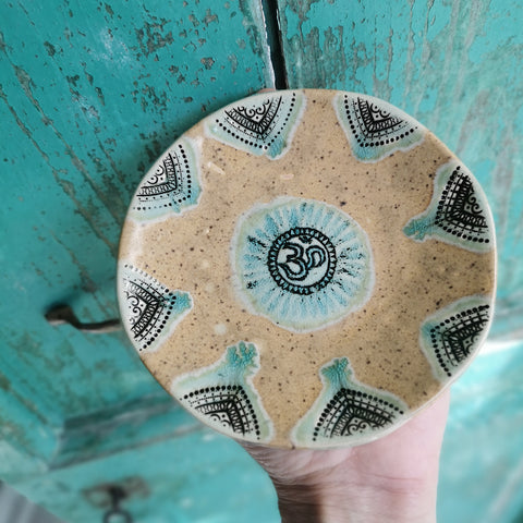 Honey brown ceramic bowl with ohm symbol