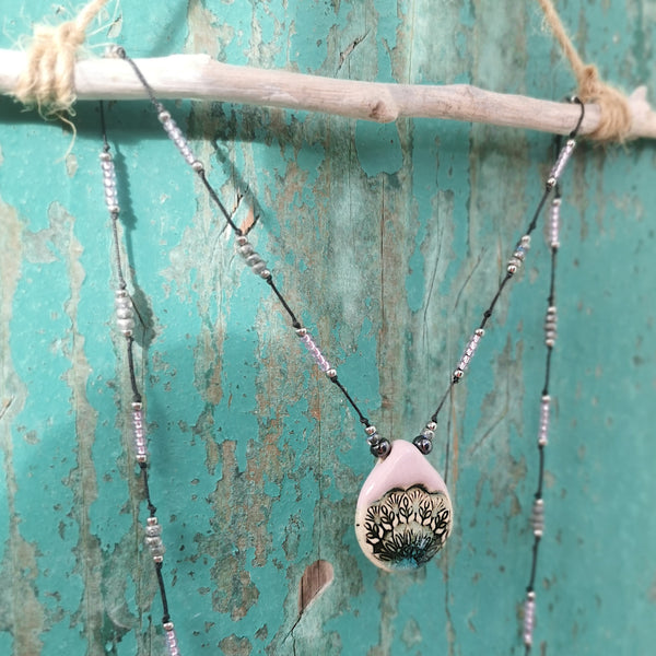 Colorful ceramic necklace with glass pearls