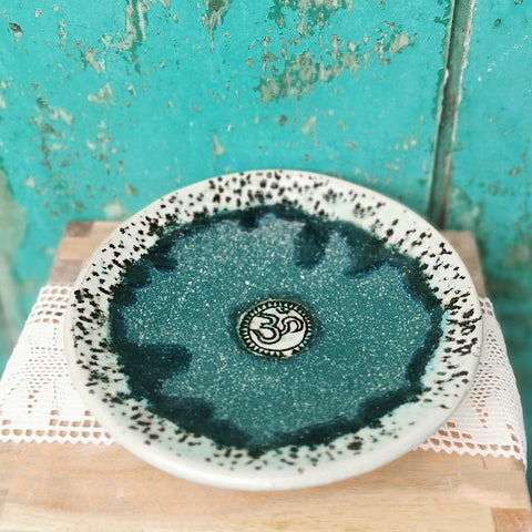 Sparkling green ceramic bowl with ohm sign